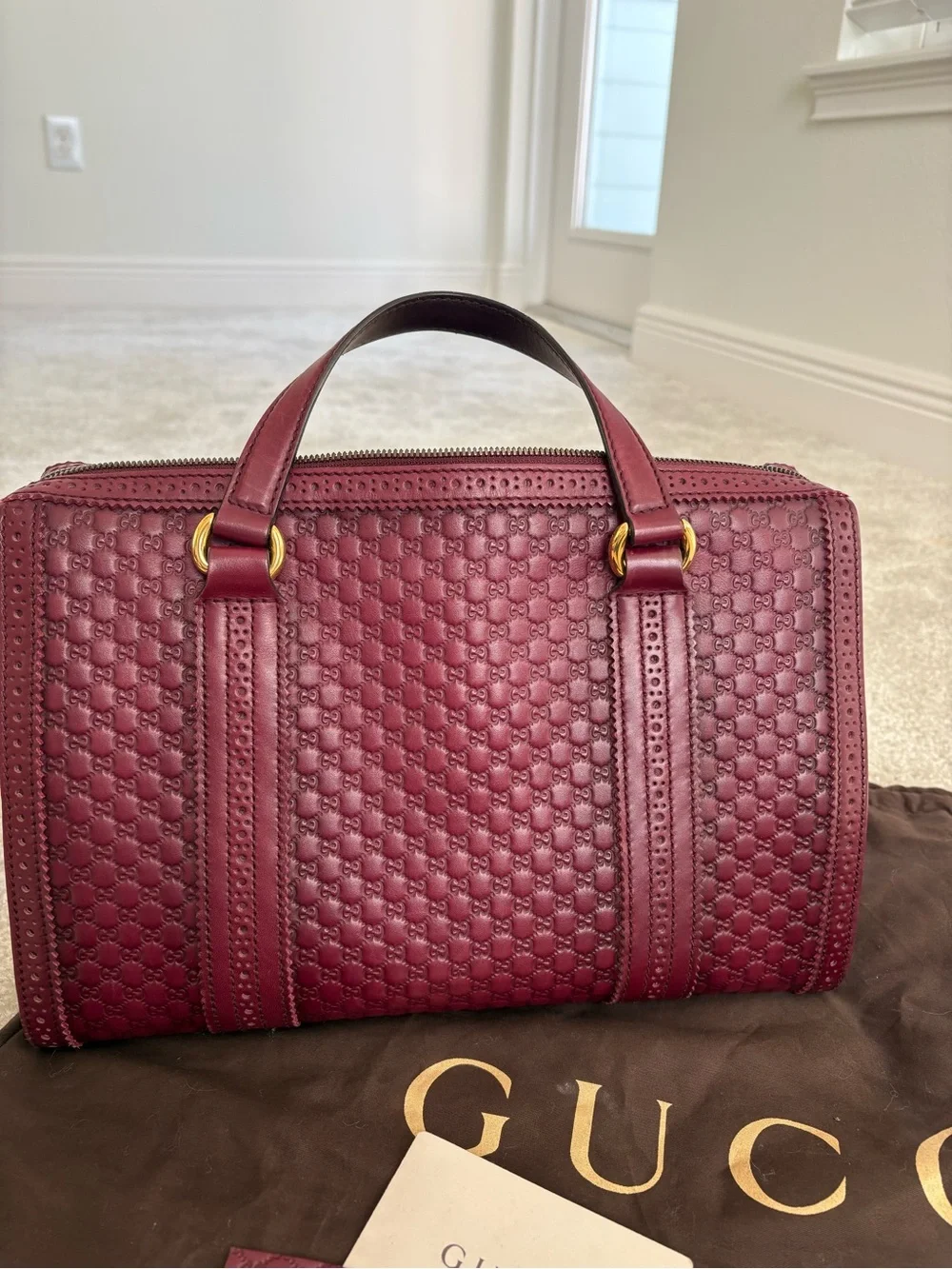 Gucci Burgundy Leather Tassel Satchel with Embossed Monogram